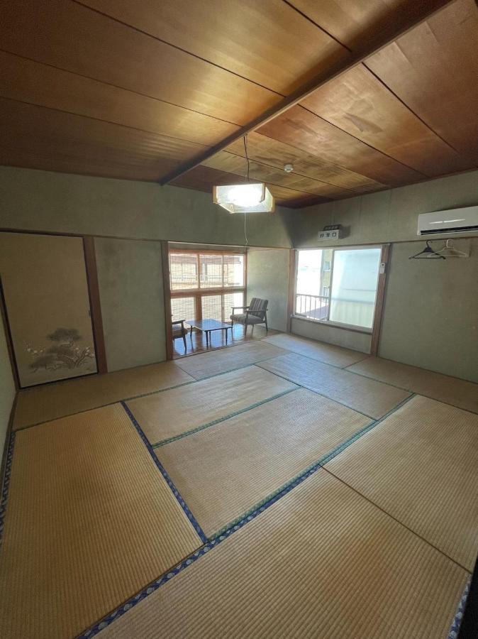 素泊まり民宿とみや 大島 エクステリア 写真