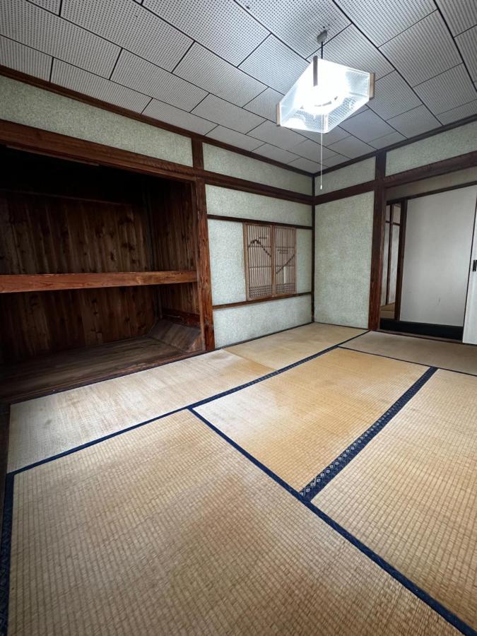 素泊まり民宿とみや 大島 エクステリア 写真