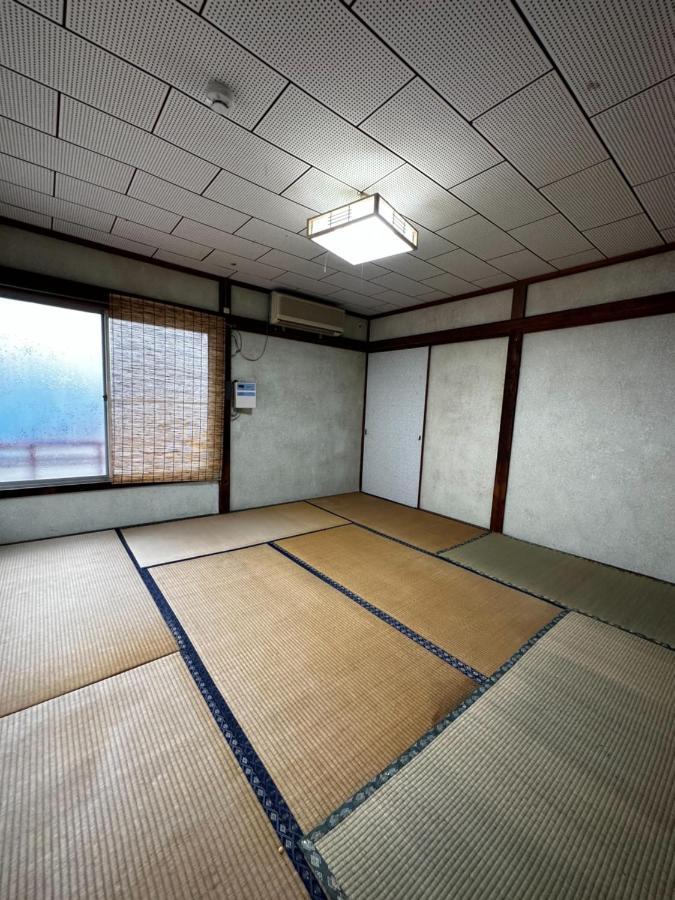 素泊まり民宿とみや 大島 エクステリア 写真
