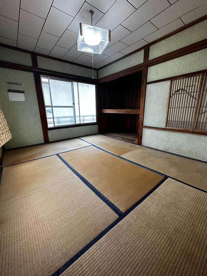 素泊まり民宿とみや 大島 エクステリア 写真