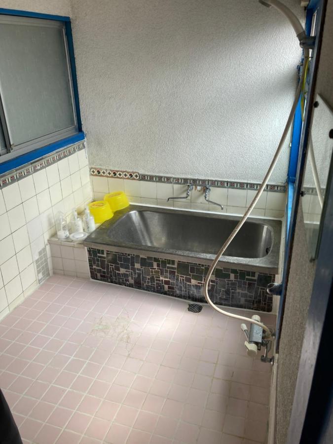 素泊まり民宿とみや 大島 エクステリア 写真